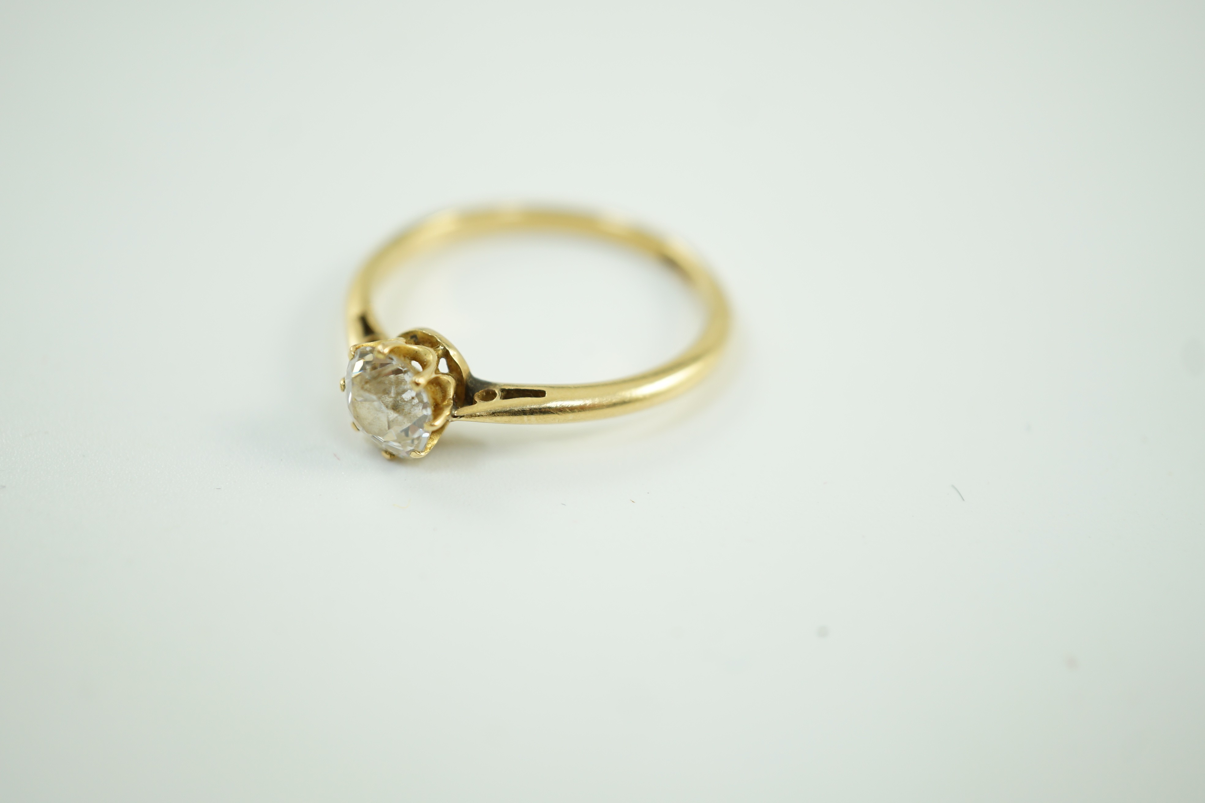 An 18ct and solitaire diamond ring